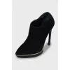 Suede ankle boots with gold decor