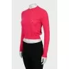 Pink jumper with perforated pattern