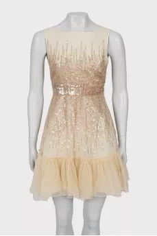 Sleeveless dress decorated with sequins