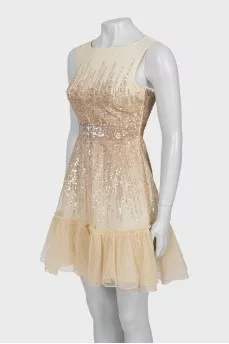 Sleeveless dress decorated with sequins