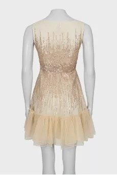 Sleeveless dress decorated with sequins