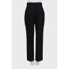 Woolen tapered trousers with creases