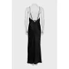 Dress with keychains and a slit