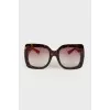 Sunglasses with red temples