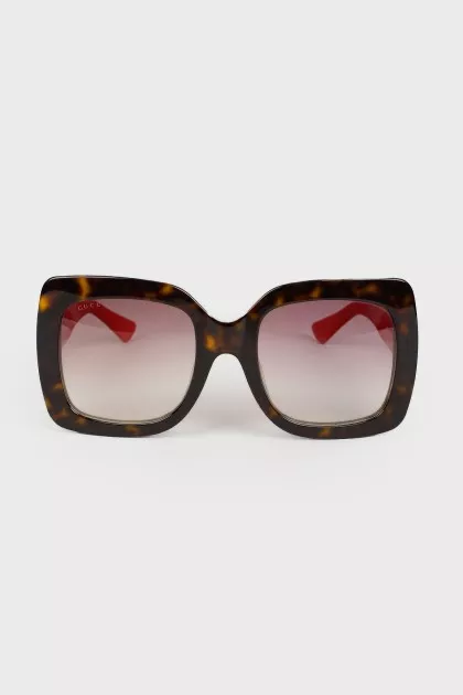 Sunglasses with red temples
