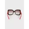 Sunglasses with red temples