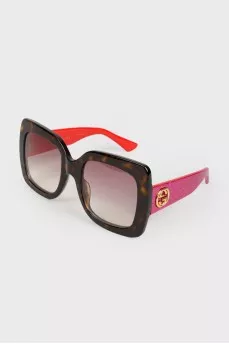 Sunglasses with red temples