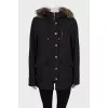 Black parka with gold fittings