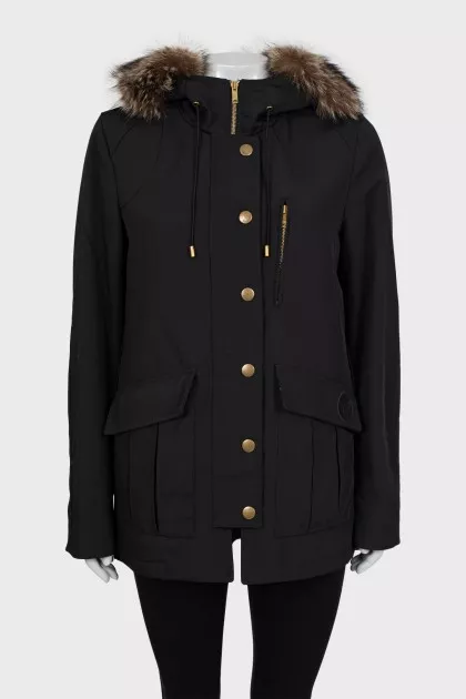 Black parka with gold fittings
