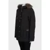 Black parka with gold fittings