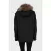 Black parka with gold fittings
