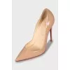 Beige patent leather pumps