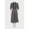 Dress with a small print and a tie