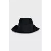 Black hat with textile decor