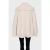 Knitted wool poncho