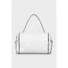 White bag decorated with weaving