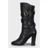 Leather boots with gold fittings