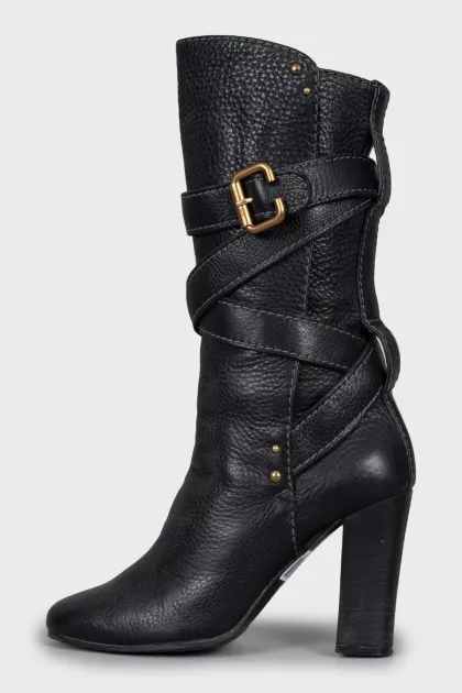 Leather boots with gold fittings