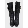Leather boots with gold fittings