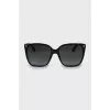 Black sunglasses with gold logo