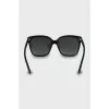 Black sunglasses with gold logo