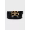 Belt with embossed leather