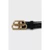 Belt with embossed leather