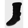 Insulated boots with gold fittings