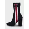 Textile ankle boots with a figured heel