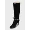 Insulated boots decorated with fur
