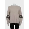 Cashmere sweater with sleeve decoration