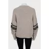 Cashmere sweater with sleeve decoration