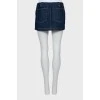 Denim skirt with golden zipper