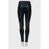 Eco-leather trousers with embossed print