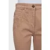 Beige jeans with embroidery