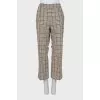 Cropped trousers in a checkered print