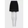 Mini skirt decorated with beads