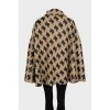 Loose cape in houndstooth print