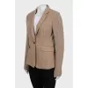 Fitted jacket with knitted sleeves