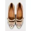 Beige shoes with pattern on suede