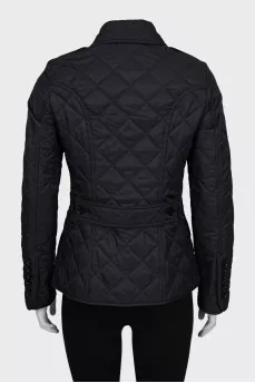 Black quilted jacket with tag