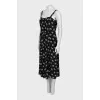 Jumpsuit with straps in the signature print