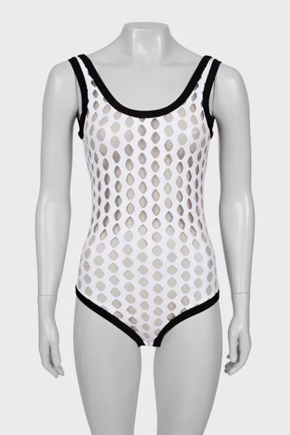 Perforated bodysuit with tag