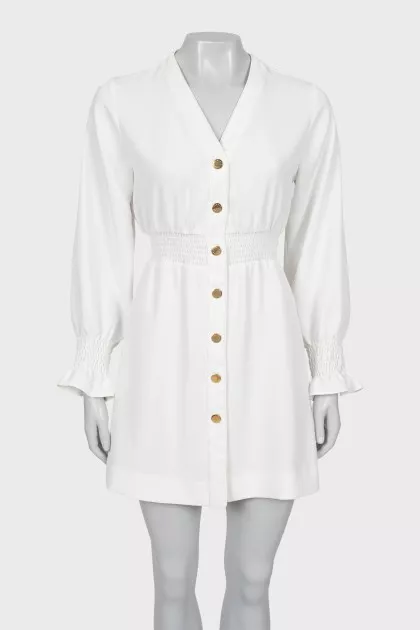 Fitted dress with gold fittings