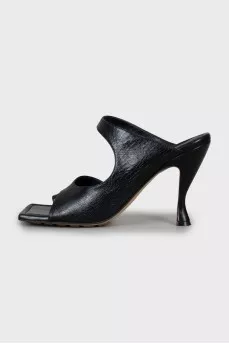 Black mules with a figured heel