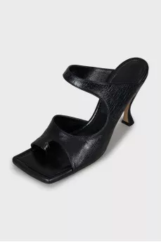 Black mules with a figured heel
