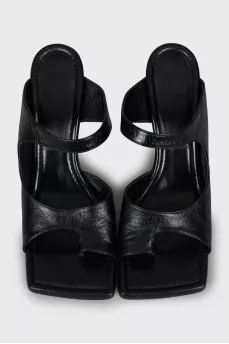 Black mules with a figured heel