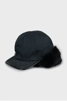 Black cap decorated with fur