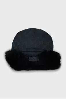 Black cap decorated with fur