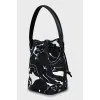 Fabric bucket bag with tag